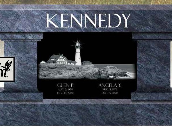 A picture of the kennedy lighthouse in front of it.