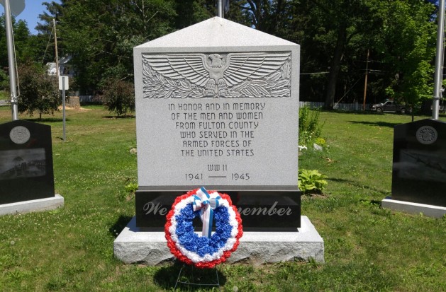 A wreath on the grave of an unknown soldier.